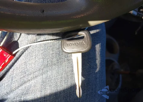 2000 Toyota Echo from USA, damaged, VIN JTDBT1231Y0071040